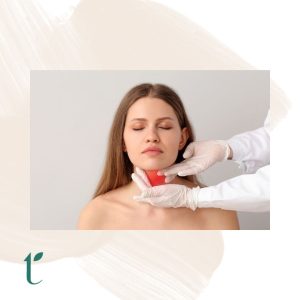 Woman with thyroid at neck