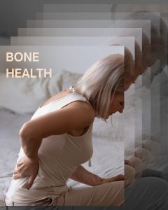 Woman holding back in pain